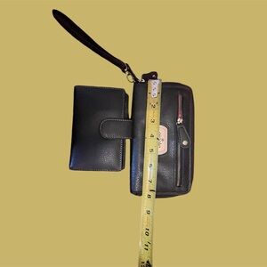 Two black wallets one new one like new